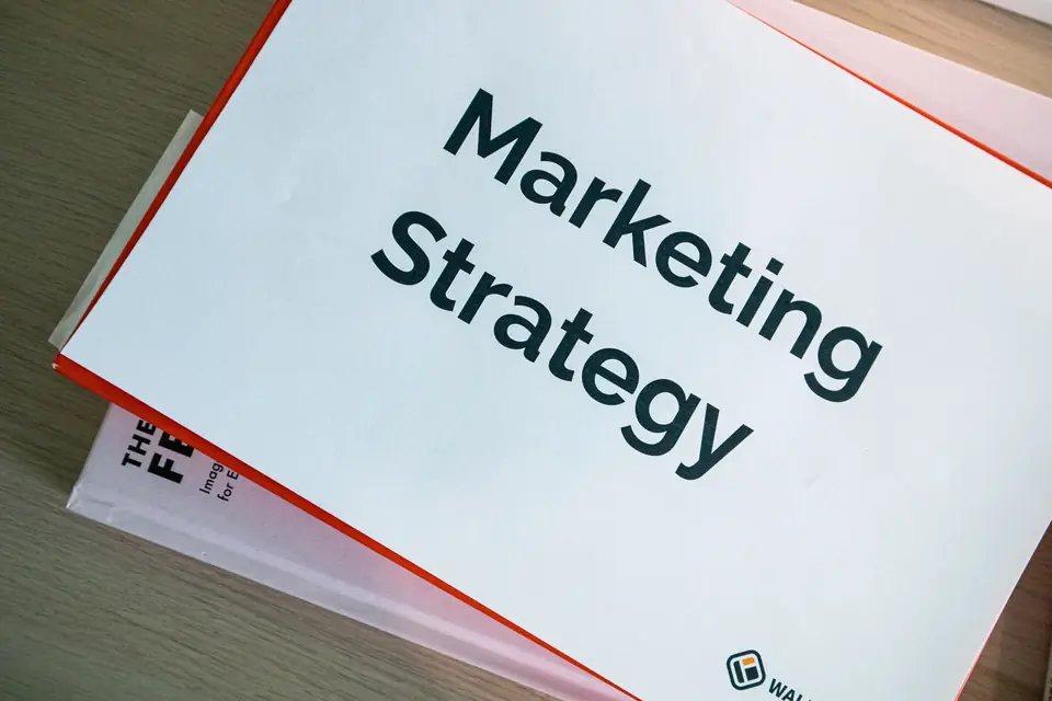 Printed marketing strategy document on a desk, the shape a content brief takes