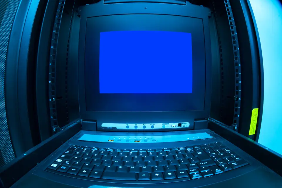 Empty glowing screen in a dark equipment room, the digital equivalent of a dead end