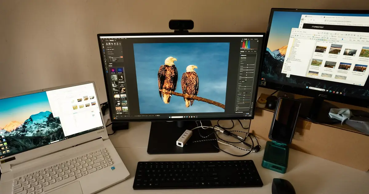 Multi-monitor workspace representing a link building software stack