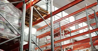 Large warehouse aisles representing crawl budget allocation across a big website