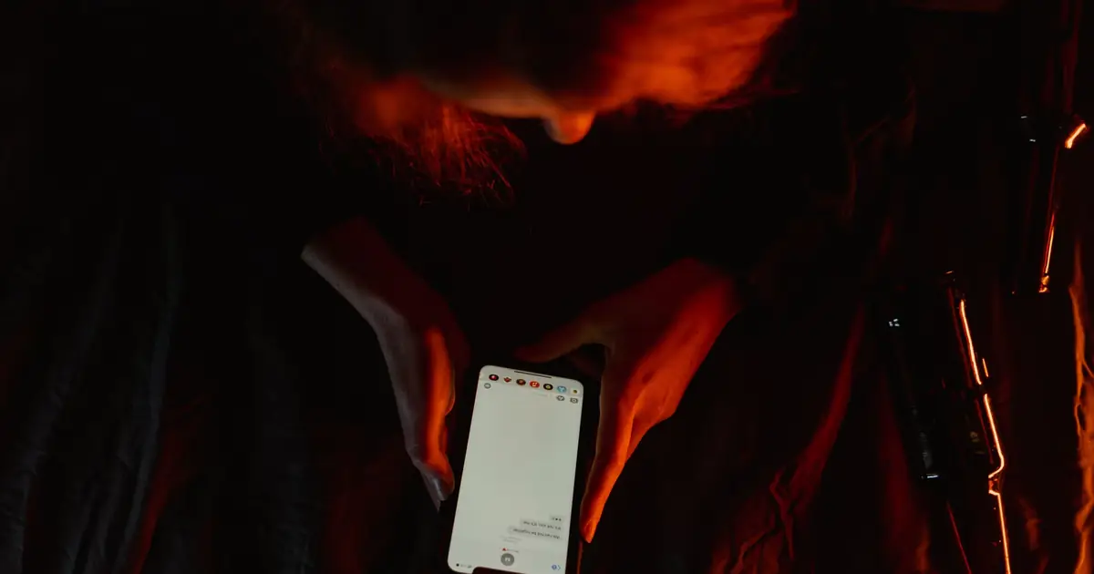 Person browsing a website on a smartphone under Google mobile-first indexing