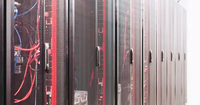 Data centre server racks representing the technical foundation of a website